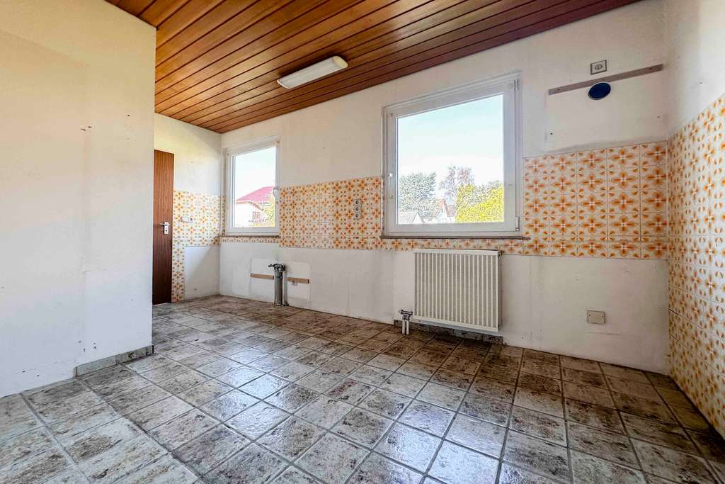 Immobilie in Hausen - Bungalow-Stil mit großzügigem Keller und Einliegerpotenzial auf sonnigem Grundstück - Bild 3