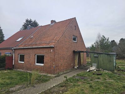 Vermietete Doppelhaushälfte mit Ausbaureserve- attraktive Kapitalanlage in Unterlüß
