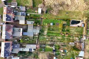 Idyllisches Familiennest: Doppelhaushälfte in Raguhn mit weitläufigem Garten und romantischem Teich – Wittenberger Straße 9, 6779 Raguhn – Vorschaubild 4