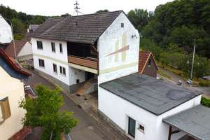 Sanierungsbedürftiges Einfamilienhaus in ruhiger Wohnlage!