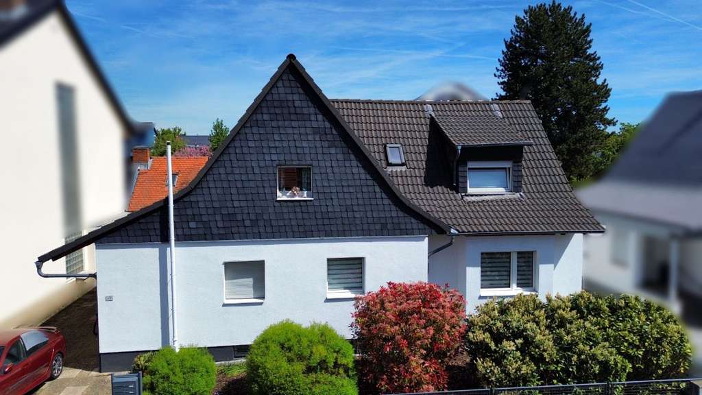 Immobilie in Kelsterbach - Vermietetes Mehrfamilienhaus mit Nebengebäude  Garten in zentraler Lage von Kelsterbach - Bild 2