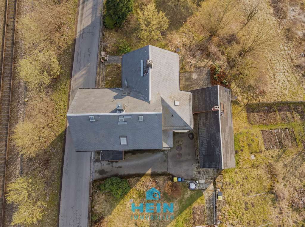 Immobilie in Lößnitz - Stabile Basis, starkes Potenzial – Dreifamilienhaus im Erzgebirge - Bild 4