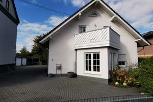 Provisionsfrei! Zwei Häuser mit 4 Garagen auf einem Grundstück zentral gelegen in Asbach (Neuwied) – Die vollständige Adresse der Immobilie erhältst du vom Anbieter., 53567 Asbach – Vorschaubild 3
