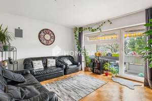 Urbaner Rückzugsort mit Weitblick: Etagenwohnung mit Balkon und Tiefgarage