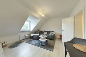 Charmante Dachgeschosswohnung mit Garage – ideal für Singles oder Kapitalanleger
