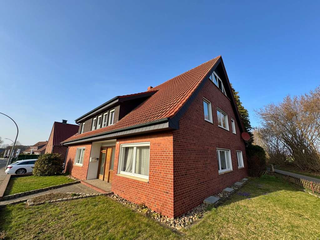 Immobilie in Emsdetten - Zweifamilienhaus mit viel Platz und traumhaftem Garten! - Bild 2