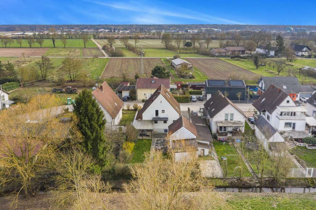 Immobilie in Lustadt - Solides Einfamilienhaus mit Garten, großer Garage und Entwicklungspotenzial - Bild 3