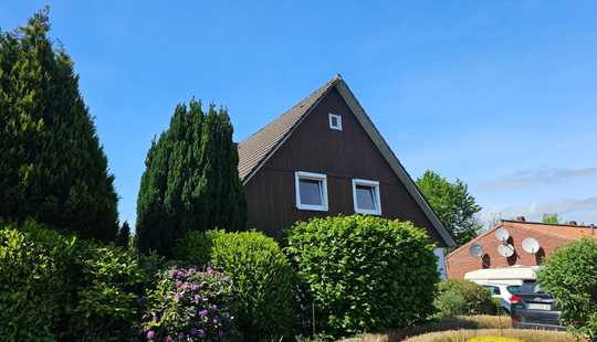 Bild von „Großzügiges Ein- bzw. Zweifamilienhaus in guter Lage von Schortens – Für Familie, Beruf & mehr“