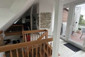 Außergewöhnliche Maisonettewohnung mit Galerie, Kamin und Dachterrasse