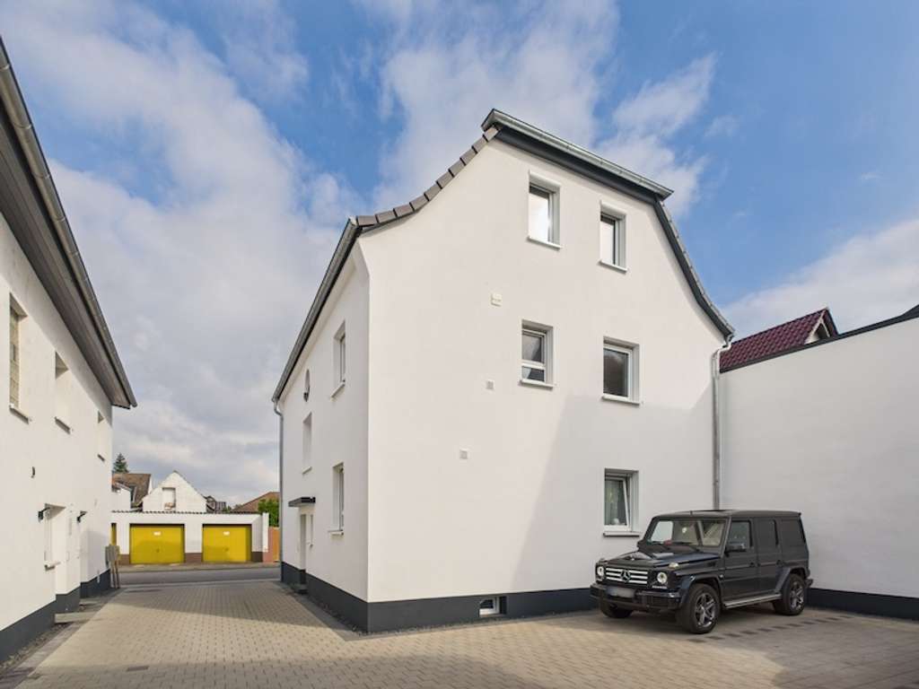 Immobilie in Büttelborn - Stilvolles Wohnen mit Charme! Anspruchsvoll saniertes 2 Familienhaus -im WEG-Verbund- in Worfelden - Bild 1