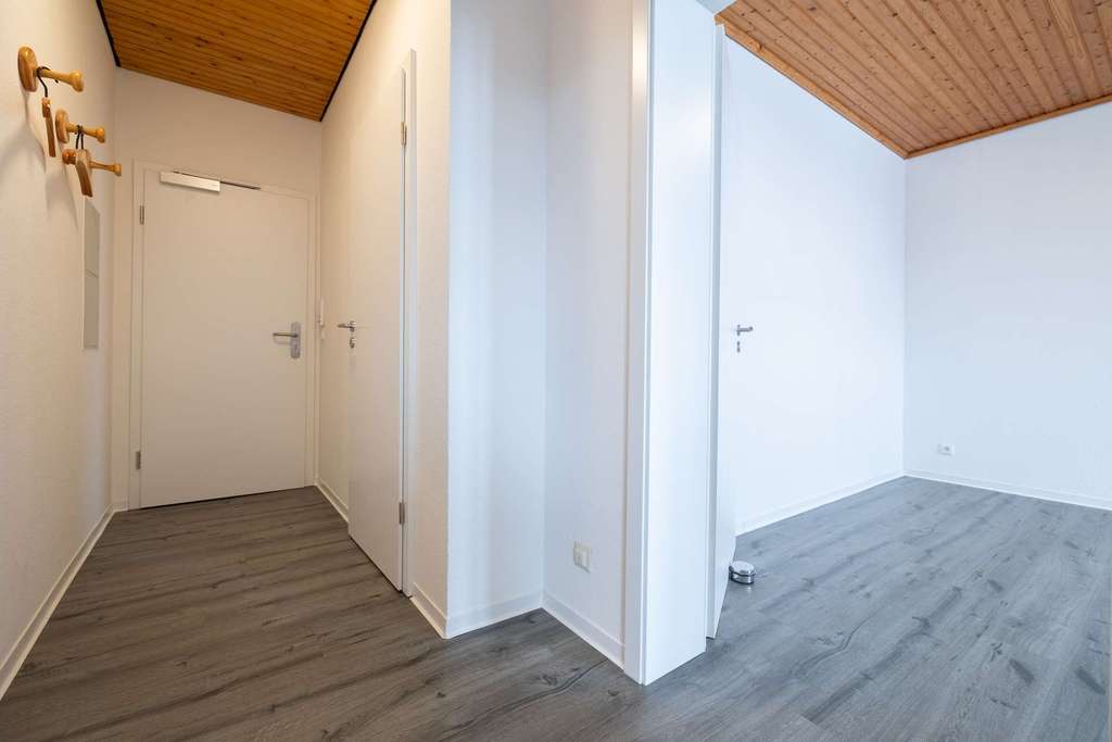 Immobilie in Meldorf - Stil trifft Geschichte | Renovierte 2-Zimmer-Wohnung im alten Schlosshotel - Bild 1