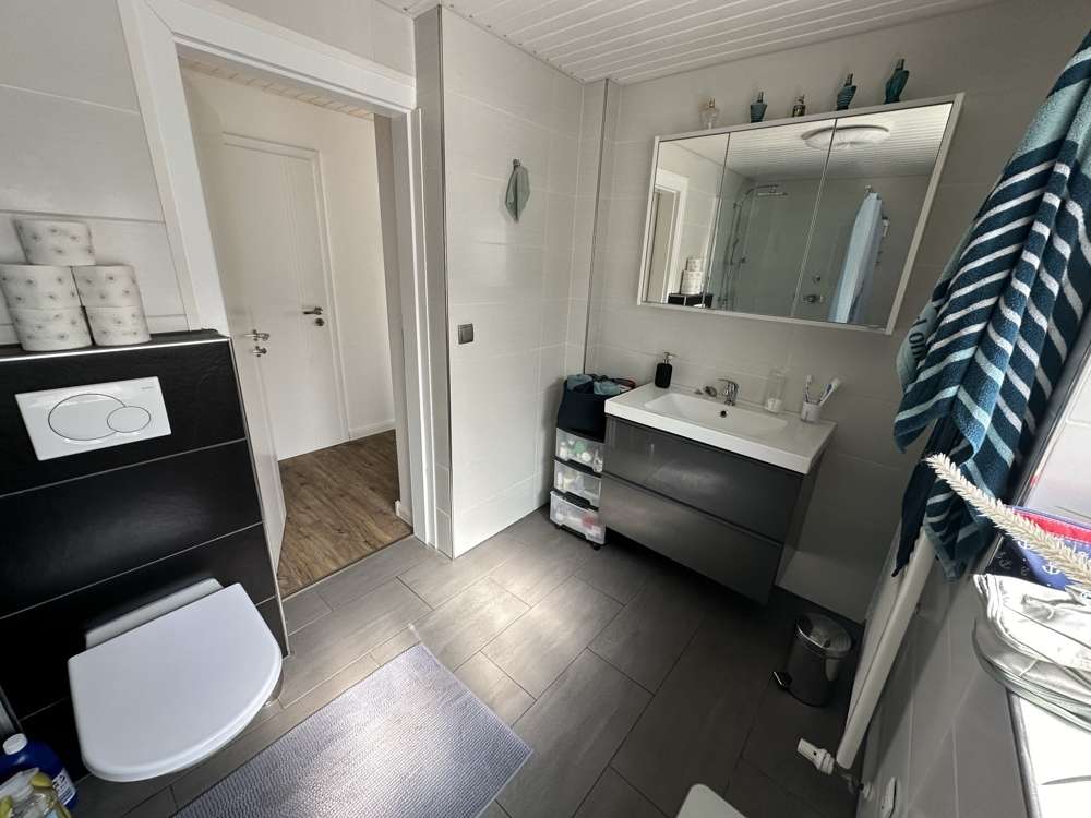 Immobilie in Ostrhauderfehn - Tolles Einfamilienhaus mit Einlieger- und Obergeschosswohnung im Herzen von Ostrhauderfehn! - Bild 2