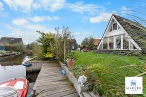 ~~Licht. Lage. Leichtigkeit. Ferienhaus mit Sonne im Gesicht und Wasser zu Füßen ~~ – Die vollständige Adresse der Immobilie erhältst du vom Anbieter., 26624 Südbrookmerland – Vorschaubild 1