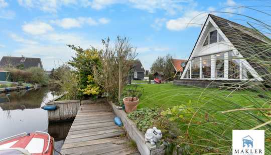 Bild von ~~Licht. Lage. Leichtigkeit. Ferienhaus mit Sonne im Gesicht und Wasser zu Füßen ~~
