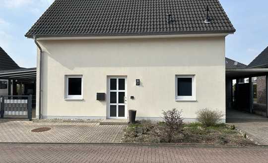 Einziehen & Wohlfühlen: Modernes Familienidyll mit Kamin und Traumgarten in Seppenrade