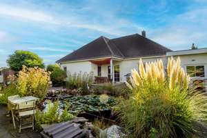Energieeffizienter Walmdach-Eckbungalow mit Urlaubsfeeling – Die vollständige Adresse der Immobilie erhältst du vom Anbieter., 47495 Rheinberg – Vorschaubild 1