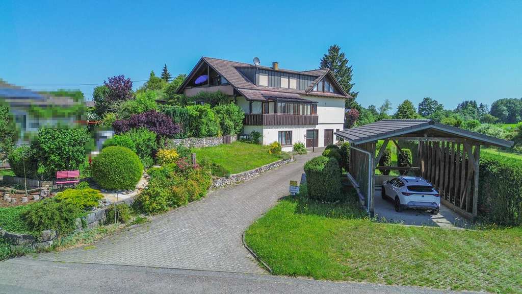 Immobilie in Bad Waldsee - Großzügiges Wohnhaus mit drei Einheiten, Wintergarten und unverbaubarer Ortsrandlage - Bild 3