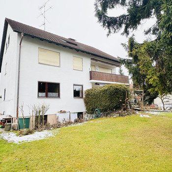 Gepflegtes Mehrfamilienhaus mit Süd-West-Garten in ruhiger Bestlage