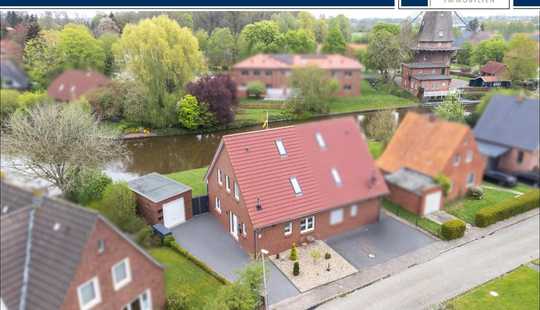 Bild von Traumhafte Wasserlage trifft moderne Effizienz – DHH in KfW 50 Bauweise