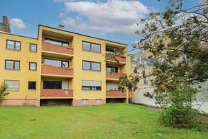 Vermietete 2-Zimmer-Wohnung mit Balkon und PKW Stellplatz in den grünen Hinterhof 