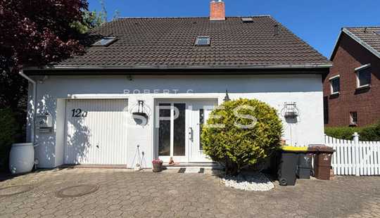 Bild von Einfamilienhaus mit guter Raumaufteilung in rückwärtiger Baureihe