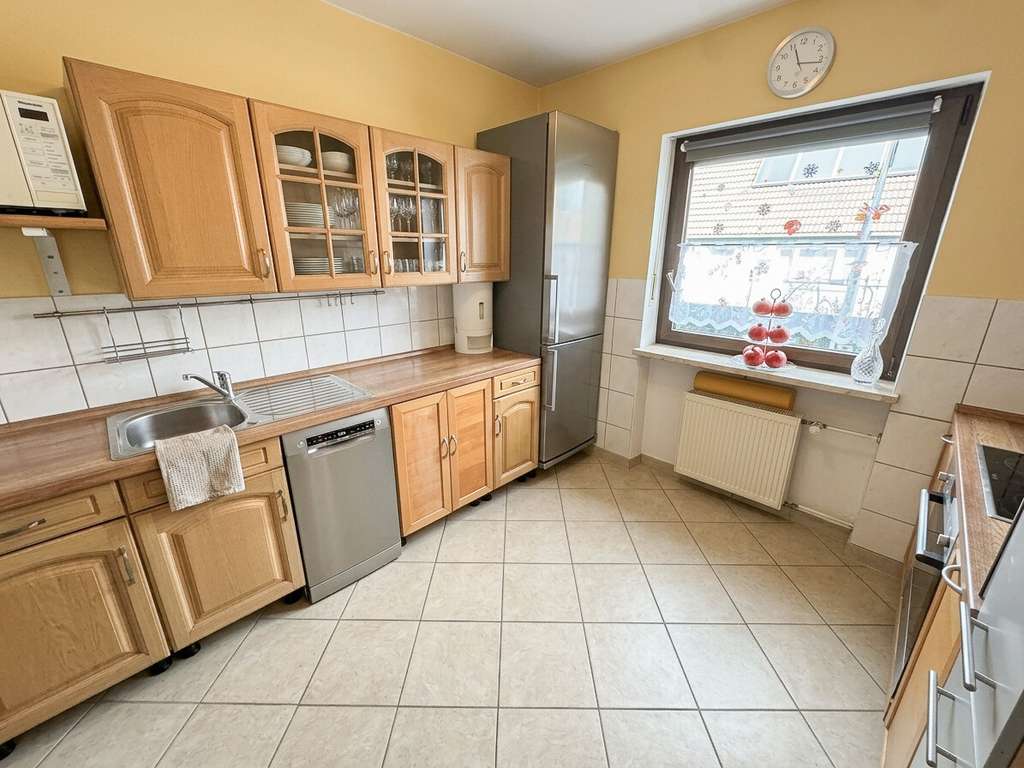 Immobilie in Karlsfeld - Vermietetes Reihenmittelhaus in ruhiger Lage von Karlsfeld - Bild 3