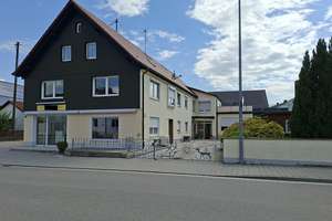 Wohn-/Geschäftshaus mit 2 Wohneinheiten, ehem. Bäckereifachgeschäft und Gewerbe-/Nutzflächen