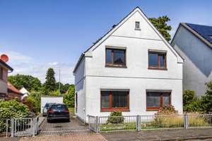 Einfamilienhaus mit großzügigem Grundstück und Garage in beliebter Lage von Bremen Fähr-Lobbendorf