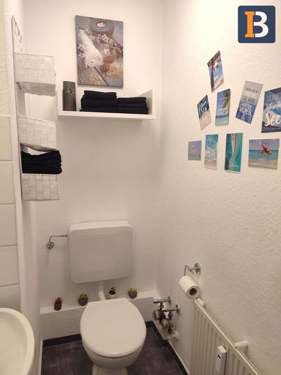 Immobilie in Schliengen - Helle 4-Zimmer-WHG mit 2 Balkonen und Weitblick über Schliengen! - Bild 2