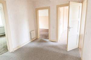 Sanierungsbedürftige Wohnung mit viel Potenzial und eigenem Gartenbereich