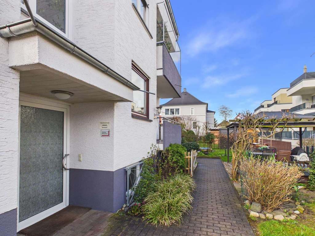 Immobilie in Bruchköbel - Großzügige Eigentumswohnung mit 2 Balkonen, Garage & Gartenanteil - Bild 3
