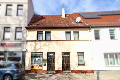 VB: Charmantes Einfamilienhaus mit zusätzlicher Einnahmequelle durch Gewerbeeinheit