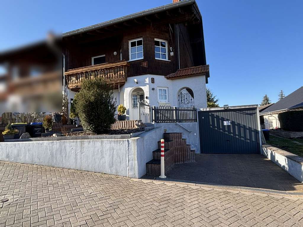 Immobilie in Fürfeld - Außergewöhnliche Architektur trifft auf Idylle! - Bild 3