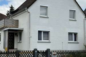 Freistehendes Einfamilienhaus in Rüsselsheim-Haßloch – solide Substanz mit Modernisierungspotenzial – Die vollständige Adresse der Immobilie erhältst du vom Anbieter., 65428 Rüsselsheim am Main – Vorschaubild 2