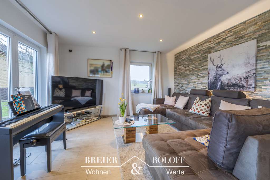 Immobilie in Apelern - Einziehen. Ankommen. Genießen. – Traumhaus mit Wellnessgarten und Weitblick in Lyhren - Bild 3