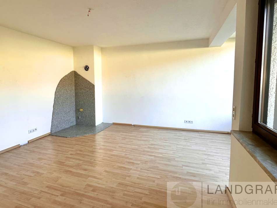 Wohnzimmer mit Kaminofenanschl