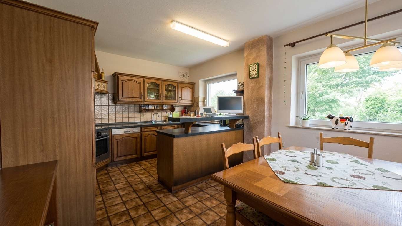 Immobilie in Essenheim - Vielseitiges Ein- bis Zweifamilienhaus mit Scheune und Kellerbar in Essenheim - Bild 2