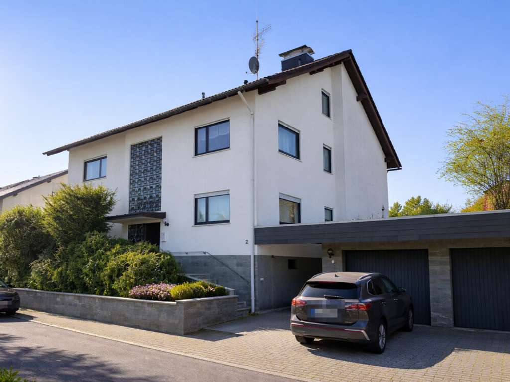 Immobilie in Eschau - Großzügiges Zweifamilienhaus mit Garten in ruhiger Wohnlage! - Bild 0