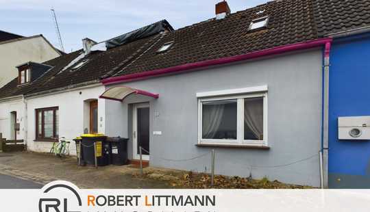 Bild von Sanierungsbedürftiges Reihenhaus mit sicherer Mieteinnahme