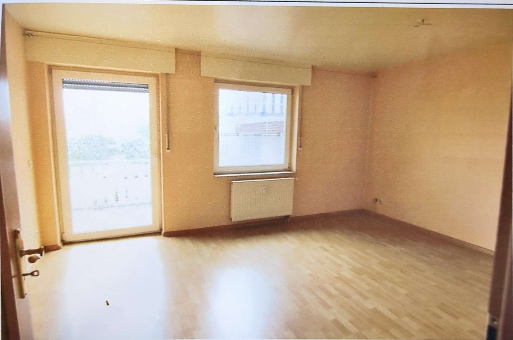 Immobilie in Voerde (Niederrhein) - Vermietete ETW mit Balkon & Stellplatz – Kapitalanlage in Voerde - Bild 1