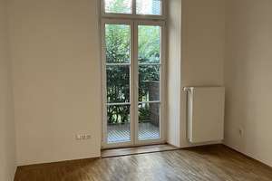 Gepflegte 2-Zimmer-Erdgeschosswohnung mit Balkon, Innenhofblick und Wohnküche – Elsenheimerstr. 24, 80687 Friedenheim, München – Vorschaubild 2