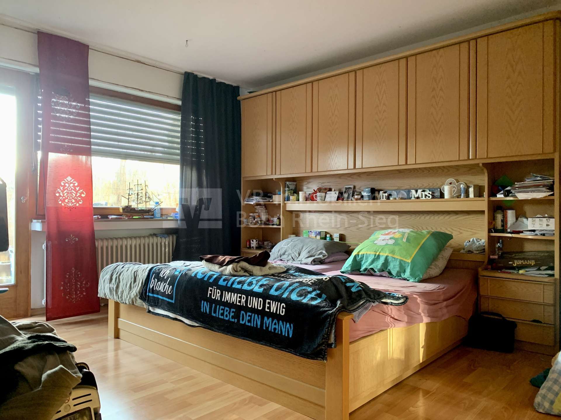 Immobilie in Niederkassel - Vermietete Doppelhaushälfte mit Sanierungsbedarf im schönen Rheidt ! - Bild 1