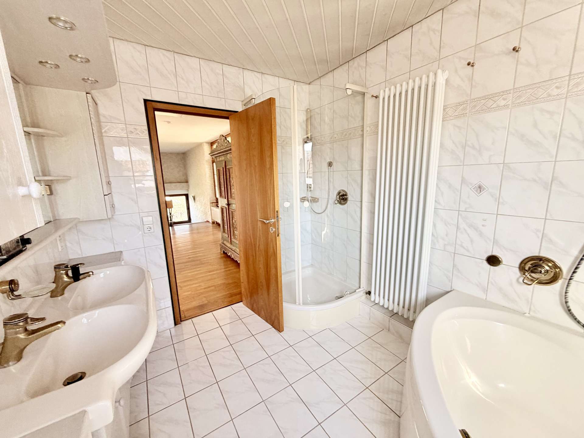 Immobilie in Sasbach am Kaiserstuhl - Charmantes Einfamilienhaus mit 5,5 Zimmern und großzügigem Grundstück - Bild 1