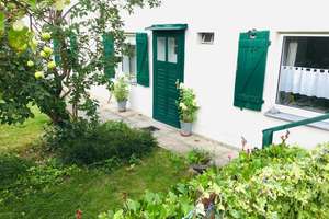 Wohnoase mit 61m² Wohnen, 16m² Hobby und 115m² Garten !