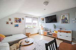 Vermietete 3-Zimmer-Dachgeschosswohnung mit Einbauküche & Stellplatz