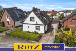 Delmenhorst-Stickgras | Ruhig gelegenes Einfamilienhaus mit offener Galerie, Wintergarten und Keller
