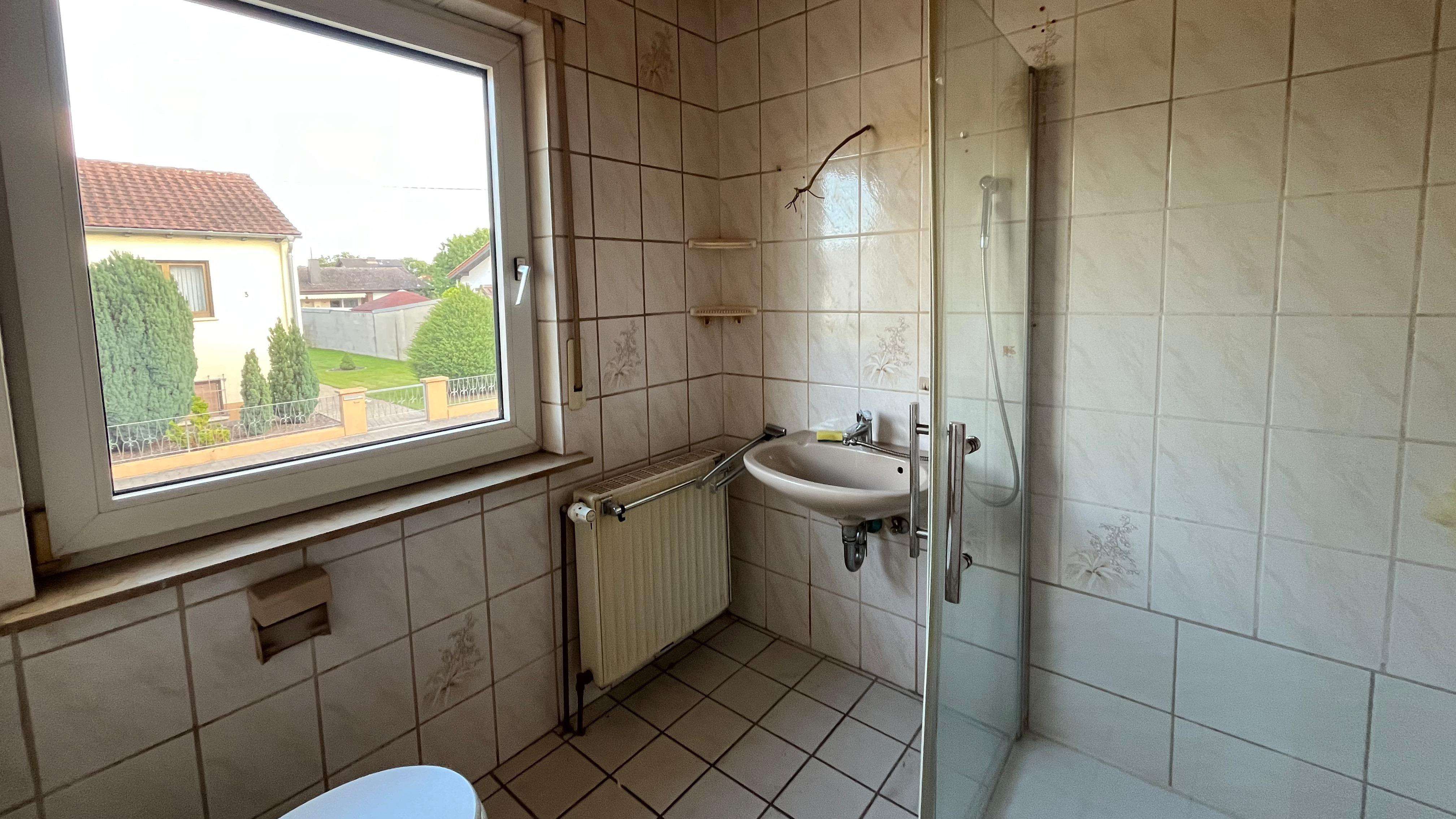 Immobilie in Hamm am Rhein - Charmantes Einfamilienhaus mit Potenzial - Bild 2