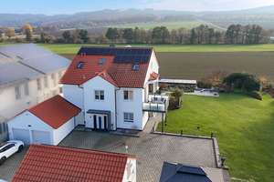 High-End-Residenz am Feldrand, flexibel nutzbar mit weiterem Baupotenzial, 4 Garagen & 10 Stellpl. – Die vollständige Adresse der Immobilie erhältst du vom Anbieter., 61273 Wehrheim – Vorschaubild 1