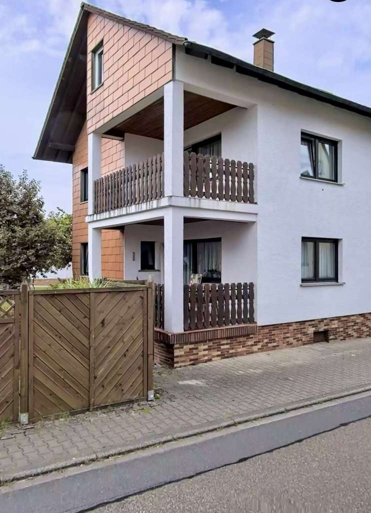 Immobilie in Dielheim - Familienfreundliches Einfamilienhaus mit Vielfältigen Nutzungsmöglichkeiten - Bild 1