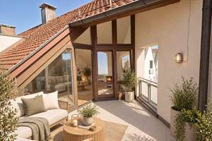 Charmante 2-Zimmer-DG-Wohnung mit Kamin und sonniger Dachterrasse in begehrter Lage